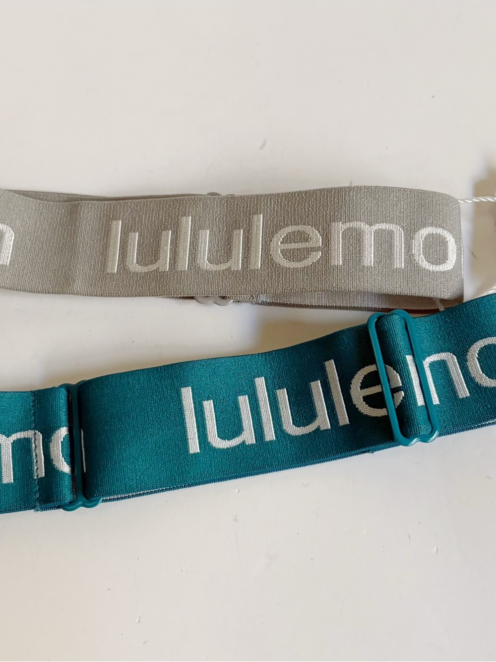 2 lululemon athletica Adjustable Teal and Silver Logo Hair Bands